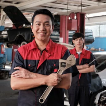 Tap-to-pay-use-case-for-repair-services-man-technician-with-wrench-smiling